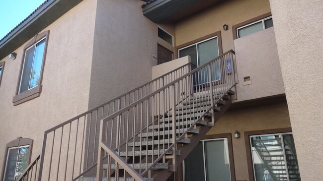 Building Photo - SECOND STORY CONDO IN GATED COMMUNITY WITH...
