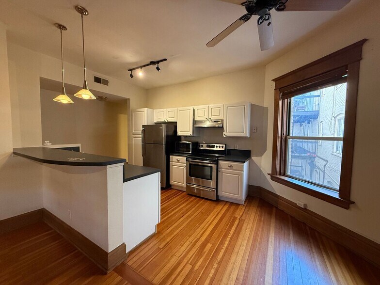 Building Photo - 1210 E Colfax Ave