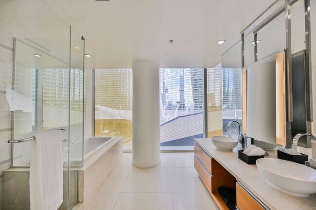 Building Photo - Luxurious premium corner unit nearly 1600 sq ft., Impeccably furnished-turn key- 2 bedroom 2 bath...