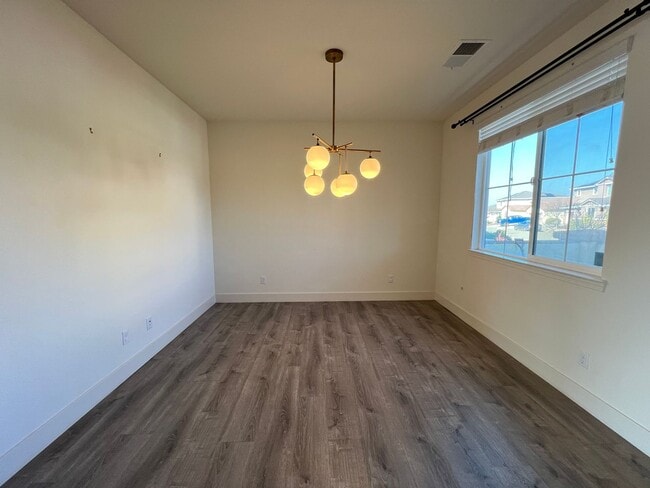 Building Photo - Beautiful 4 Bedroom Solar Home With Low Maintenance Landscaping And Updated Interior