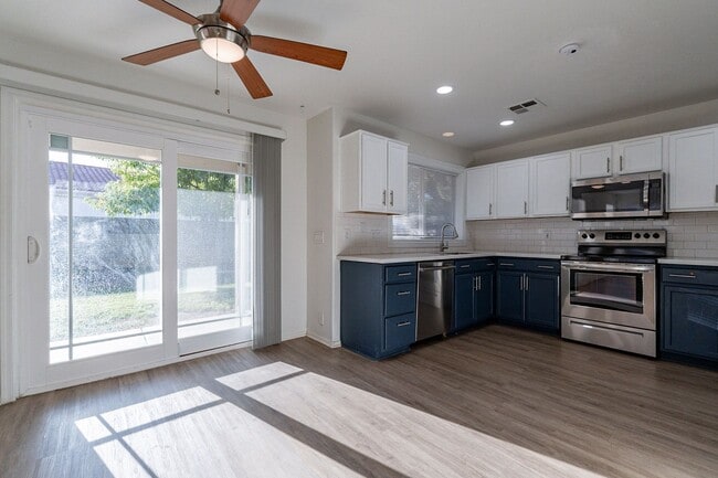 Building Photo - Spacious 5-Bedroom Home with Open Layout & Private Backyard