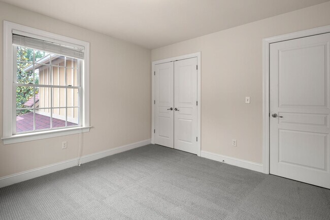 Building Photo - Five-Bedroom Tudor Home with Main-Level Primary Suite in Albemarle Reserve