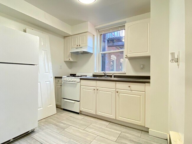 Building Photo - Nicely renovated 2 bed for now.