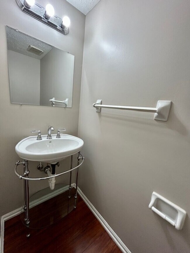 Building Photo - Welcome Home to This Beautifully Maintained Tri-Level Gem!