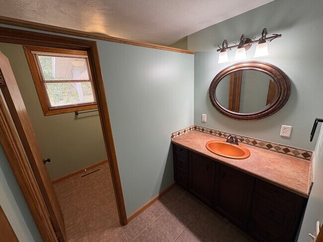 Building Photo - Spacious Home with Attached Garage & Fenced Backyard