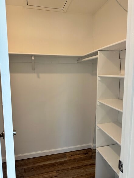 Primary walk in closet - 7044 Basswood Rd