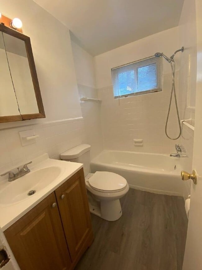 Building Photo - A spacious two bedroom, one and one half bath condo townhouse located in the northern section of ...