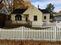 Building Photo - 3 Bedroom Home with White Picket Fence on ...