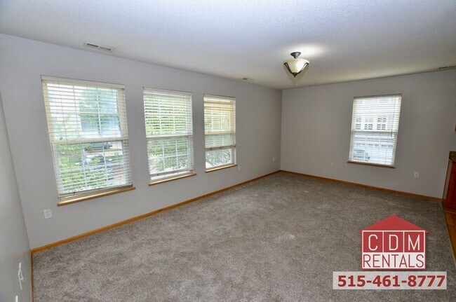 Building Photo - Wonderful Waukee Townhome