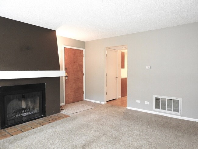 Building Photo - 9370 E Girard Ave