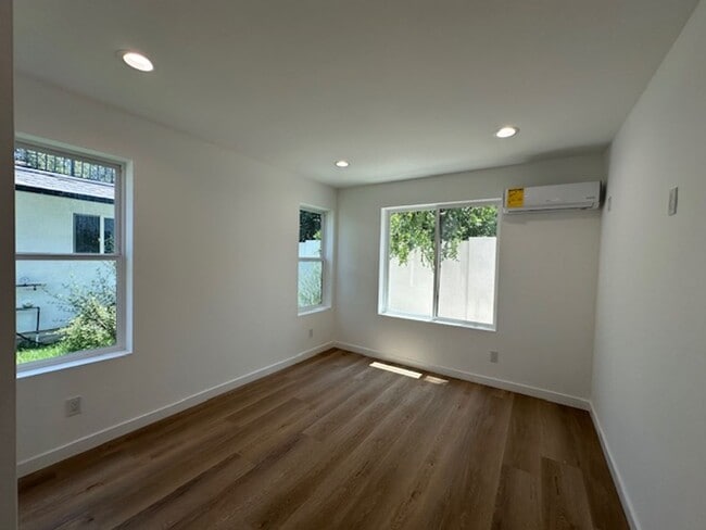 Building Photo - Brand new 3-bedroom, 2-bathroom designed f...