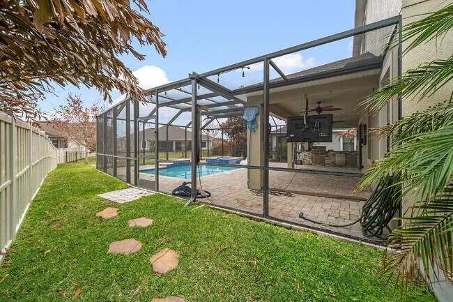 Building Photo - 4BR, 2.5BA home with resort style outdoor living!