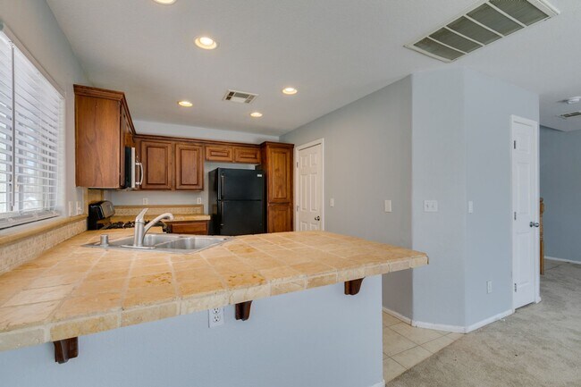 Building Photo - 8433 Spencer Canyon St