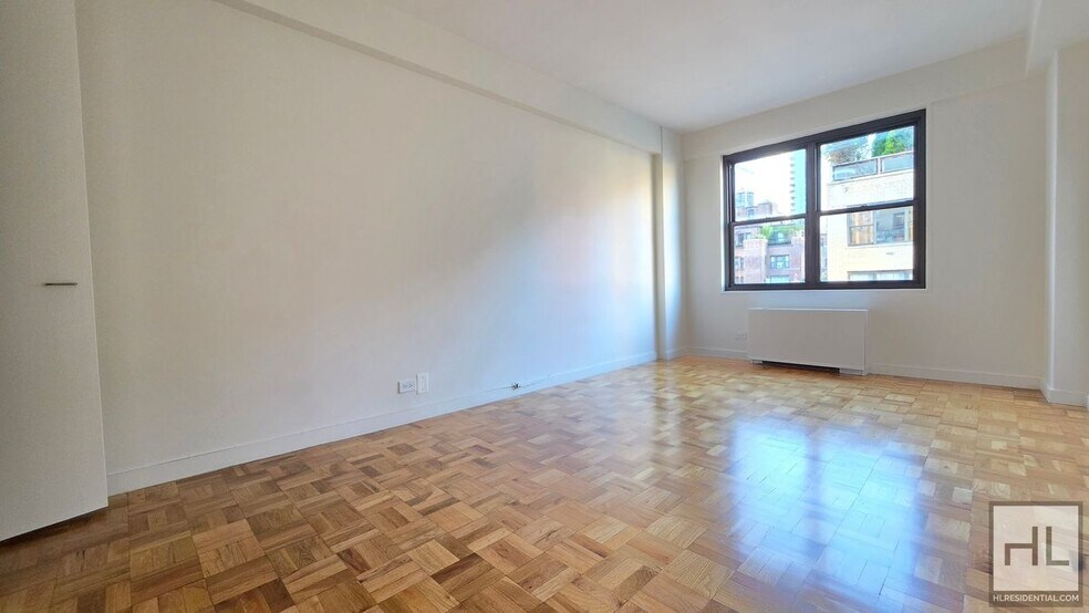 Building Photo - Sunlit 11th-Floor Corner 1-Bed with Skyline Views in Turtle Bay