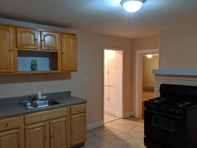 Building Photo - Three-Bedroom Apartment Near Public Transportation