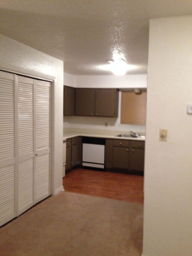 Building Photo - A FOURPLEX ON THE SHUTTLE ROUTE WITH PRIVACY FENCED YARD!!!