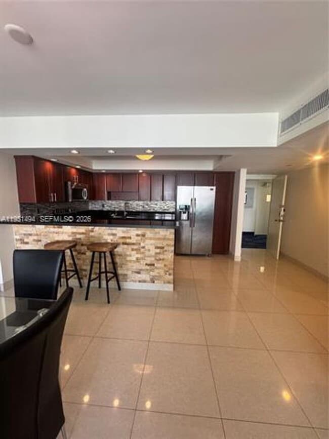 Building Photo - 19370 Collins Ave