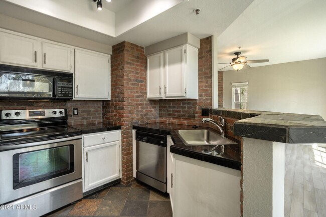 Building Photo - 9451 E Becker Ln