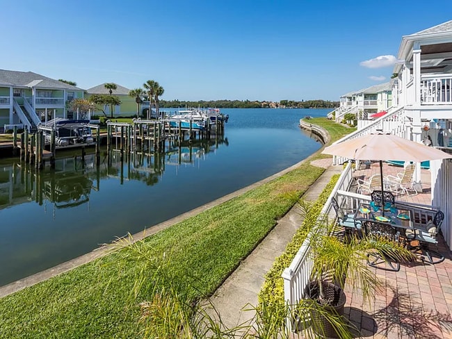 Building Photo - Stunning 2/1 available now at Waterside at Coqunia Key!