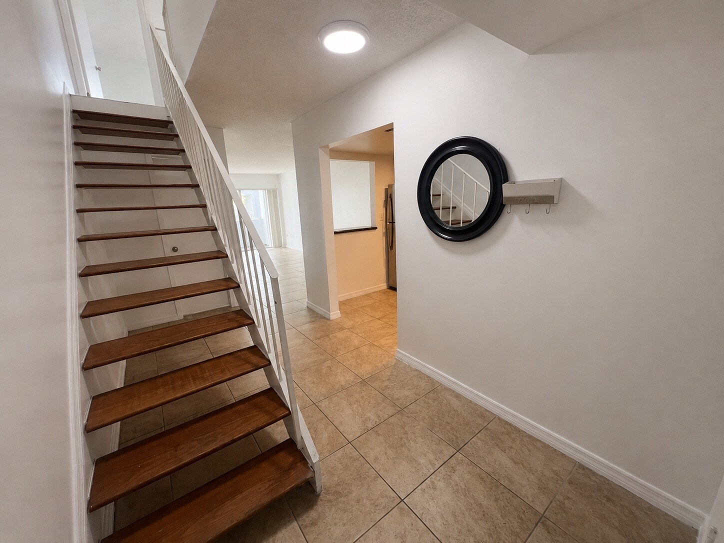 Stairs to 2nd Floor & Half Bath Door - 9371 Fontainebleau Blvd