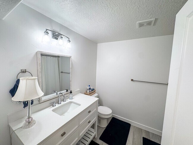 Building Photo - Modern 4 Bed / 3 Bath Home in Syracuse | Bonus Room + Fenced Yard + 86” TV Included