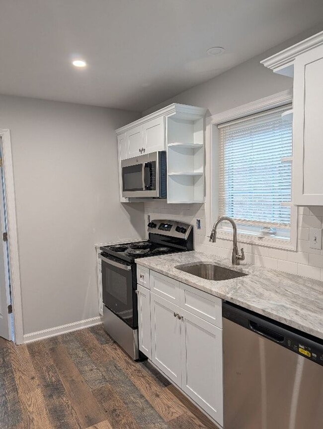 Building Photo - JM Harlan