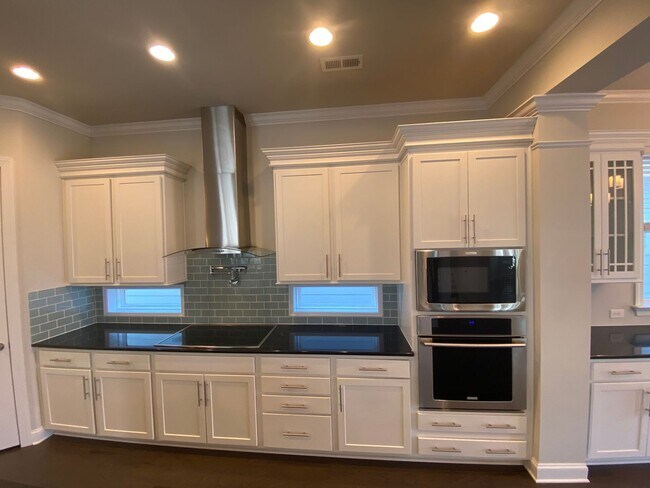 Building Photo - Stunning move in ready home located in the...