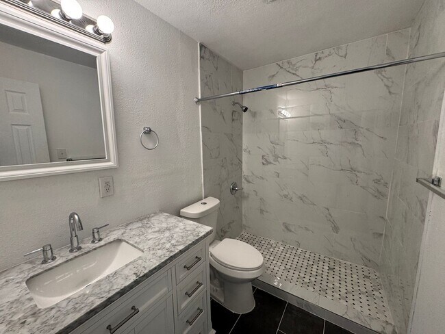 Building Photo - Recently Renovated 4/2 Home with Open Layout & Huge Backyard