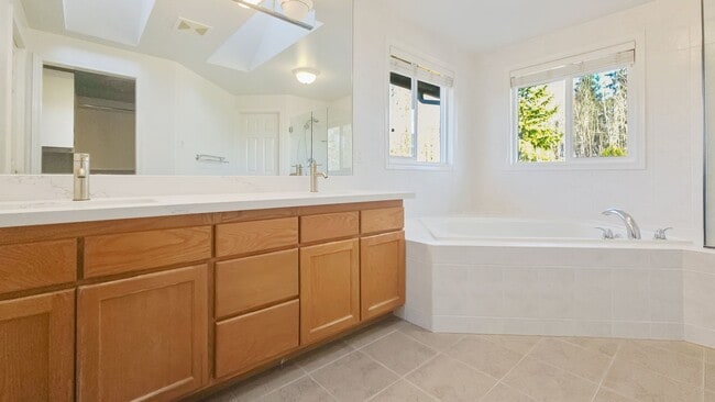 Building Photo - Spacious Updated 4 Bedroom Home with 3 Car Garage