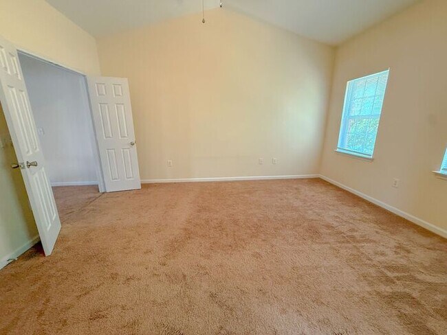 Building Photo - Beautifully updated Townhome! New cabinets, granite counter tops, and LVP flooring through downst...