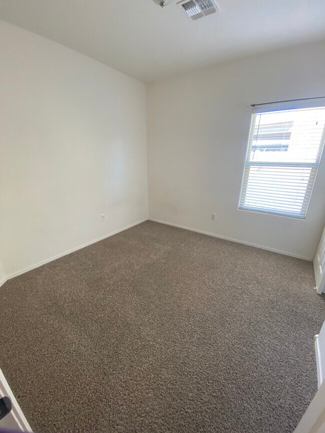 Building Photo - 8990 W Cloudwood Dr