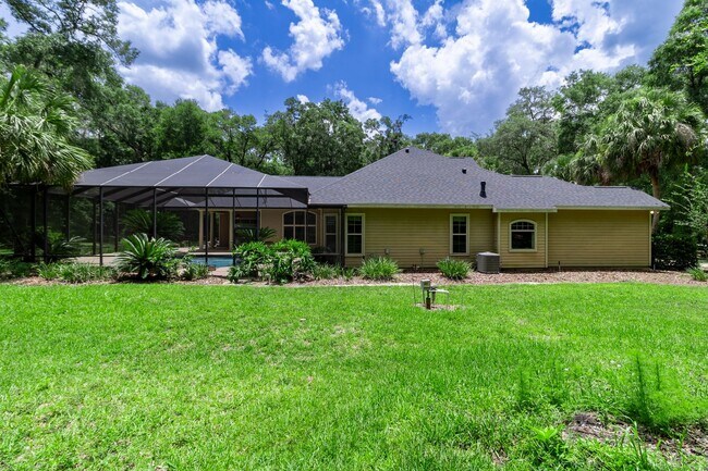 Building Photo - Executive Gainesville Rental: Custom 4 Sui...