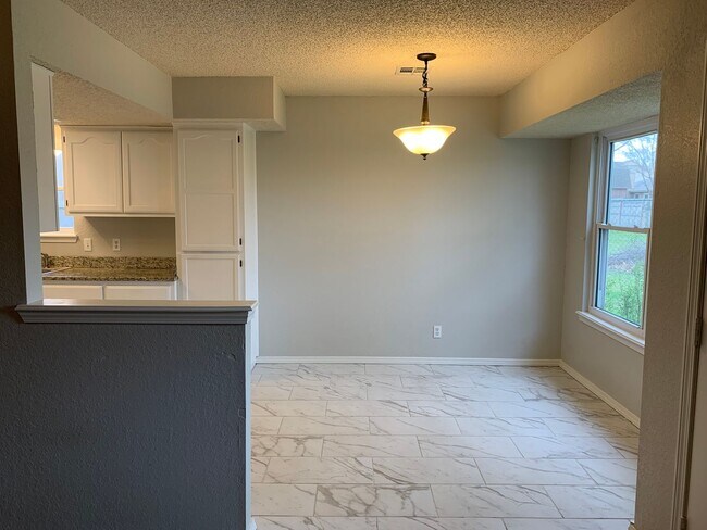 Building Photo - Don't let this one fool you-the inside is where it shines!