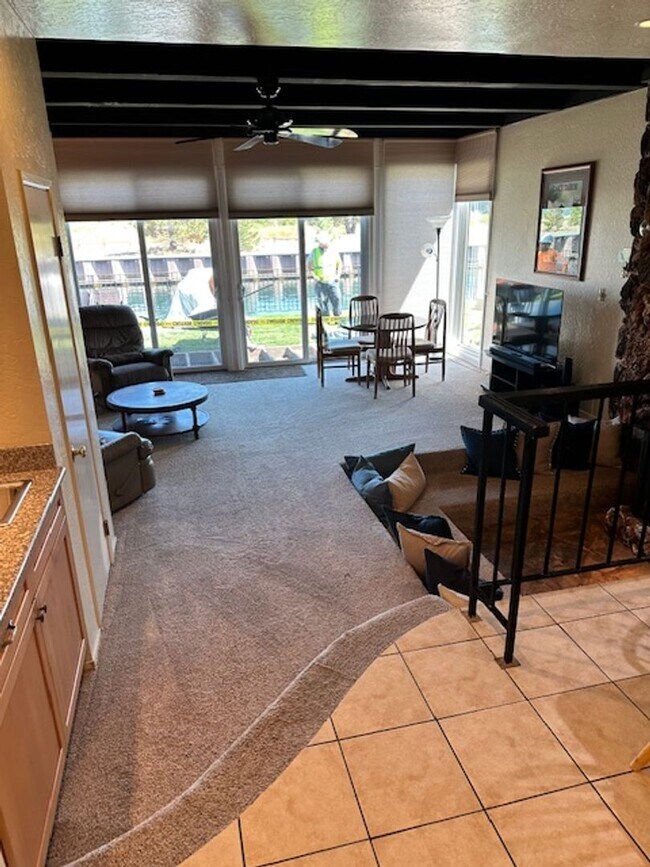 Building Photo - Condo with beautiful channel views and boat slip available for a Winter or Summer seasonal 3-6 mo...