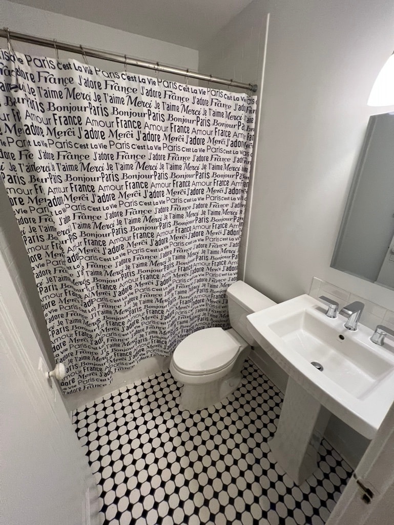 Bathroom toilet and shower - 164 Jewell St