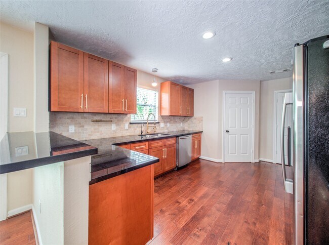 Building Photo - 13618 Woodspire Dr