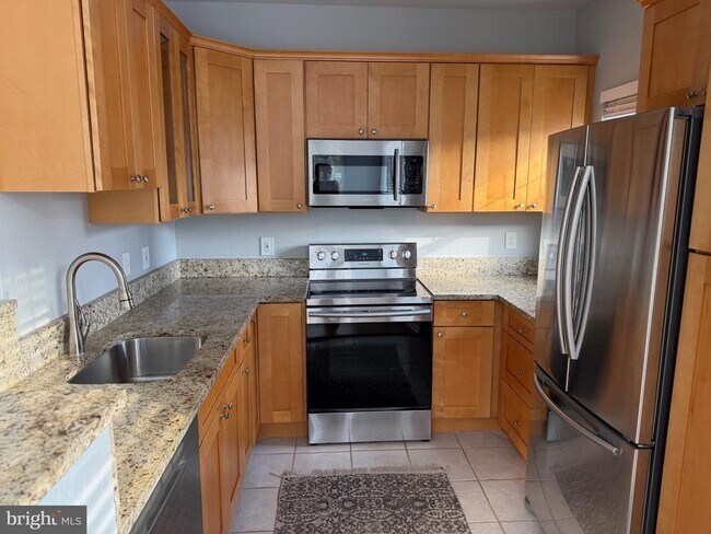 Building Photo - 1600 Spring Gate Dr.