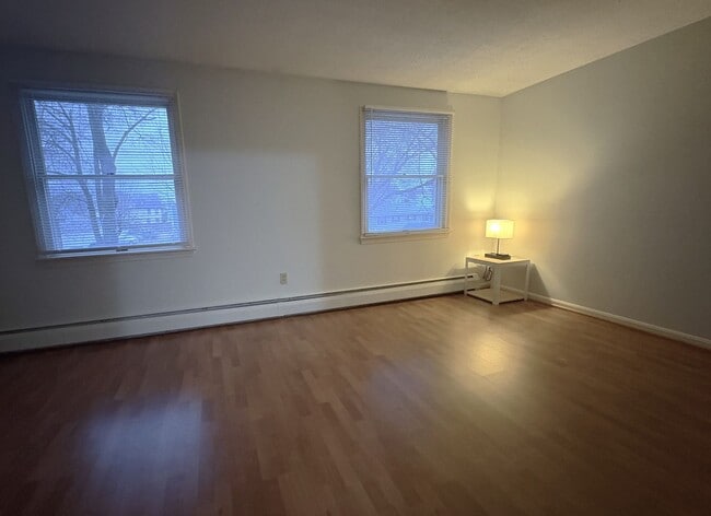 Building Photo - 10% off  1st month rent. Spacious 3 Bedroom, 2 Bath Townhouse with In-Unit Laundry in Lowell, MA