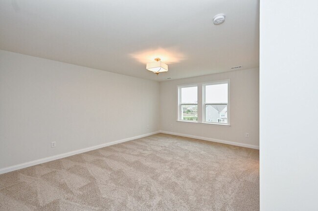 Building Photo - **BE THE LUCKY ONE TO LIVE IN THIS 2024-BUILT TOWNHOME**
