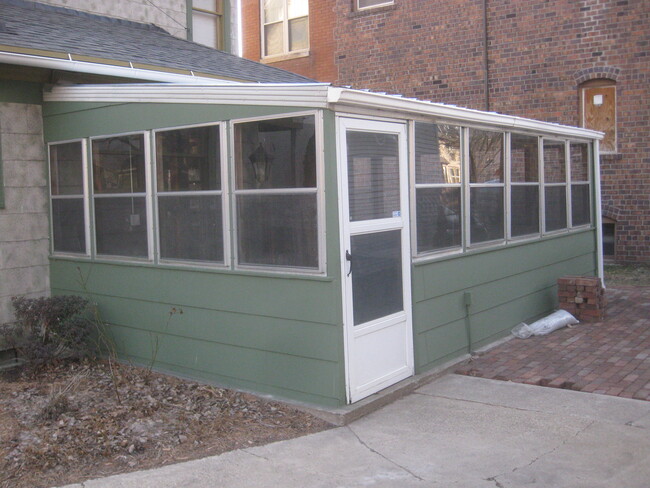 This has been replaced with a vintage 4 seasons porch - 2415 Cottage Grove Ave