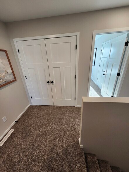 Laundry space directly off the upstairs landing - 5318 Welder Ave