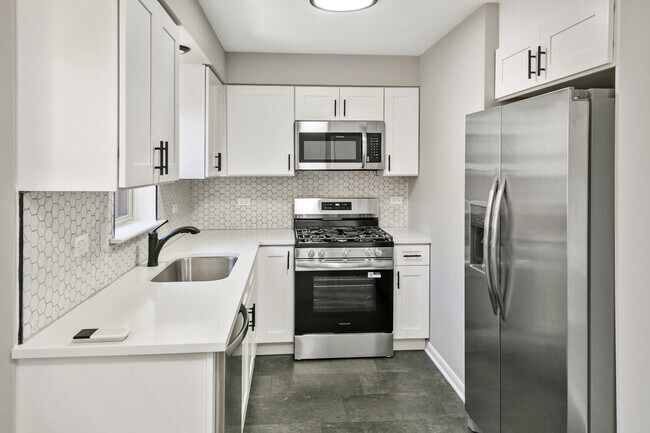 Building Photo - 7704 McVicker Ave