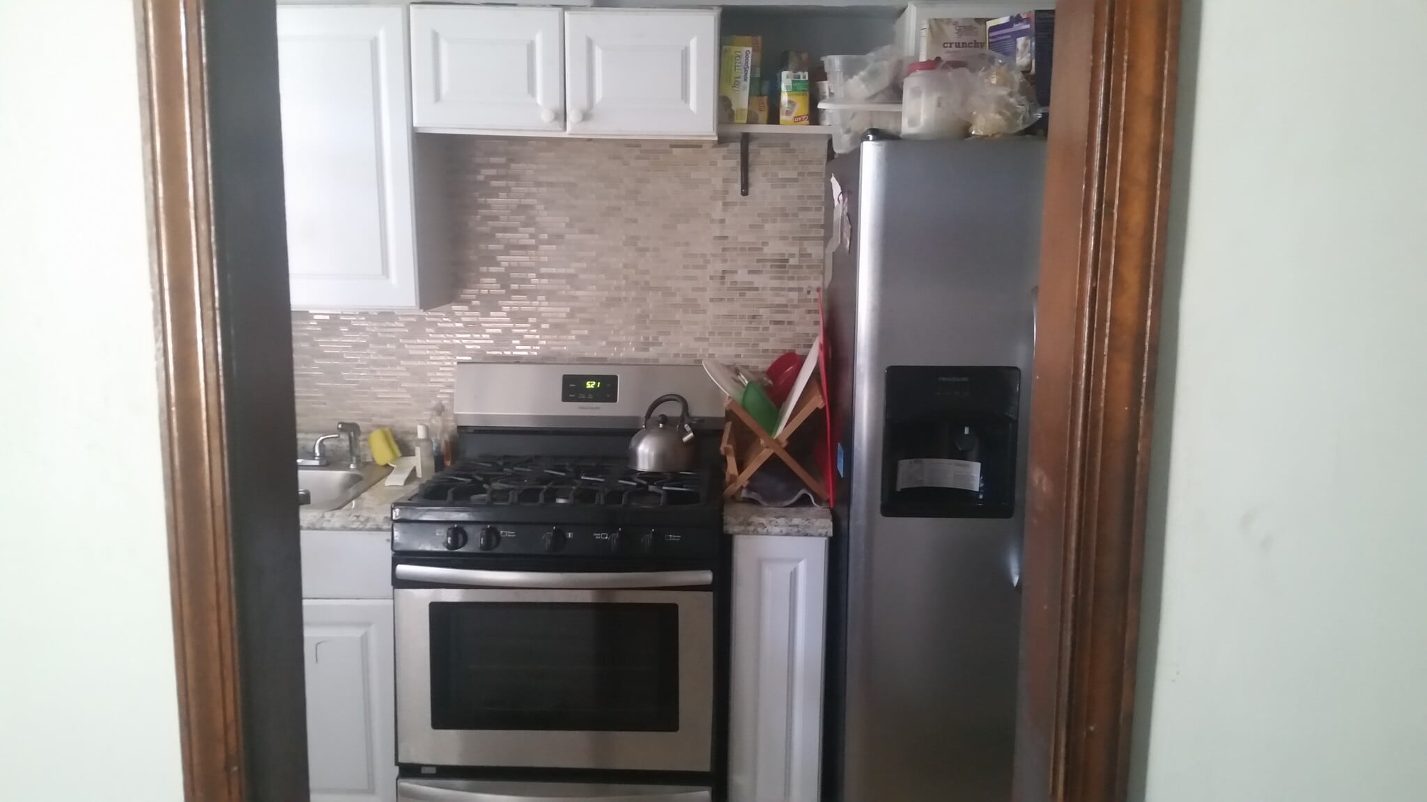 Kitchen with stainless steel appliances - 3967 Ames St NE