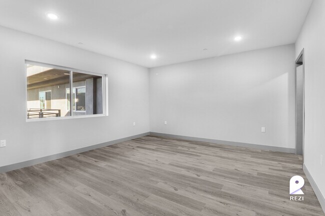 Building Photo - 7040 Woodman Ave