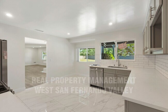Building Photo - Beautifully Remodeled Single Family Home with Pool