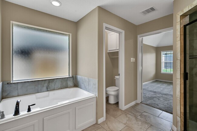 Building Photo - One story, and a 3-car garage!