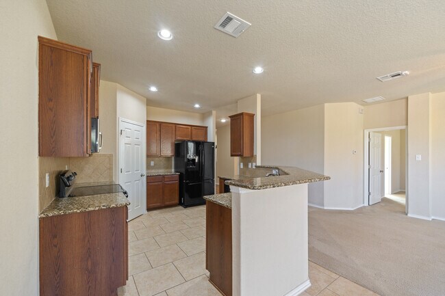 Building Photo - Spacious 4-Bed Home with Island Kitchen, Private Patio & Fenced Yard in Schertz