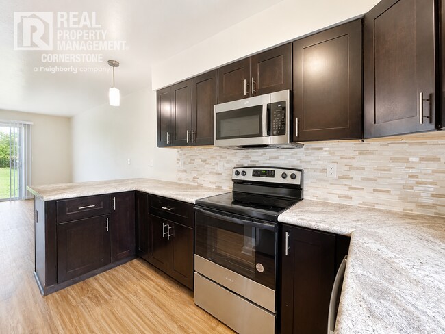 Building Photo - Modern Comfort Meets Peaceful Living