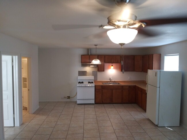 Kitchen and dining area - 403 Ellana Claire St