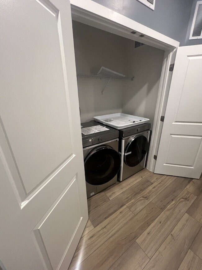 Building Photo - Brand-New Luxury 3BR Townhome-Style Condo ...